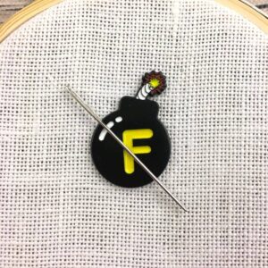 f bomb enamel needle minder or fridge magnet
