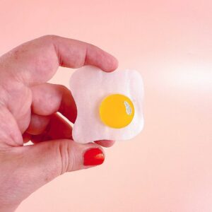 Over easy egg pop-up ruler handle